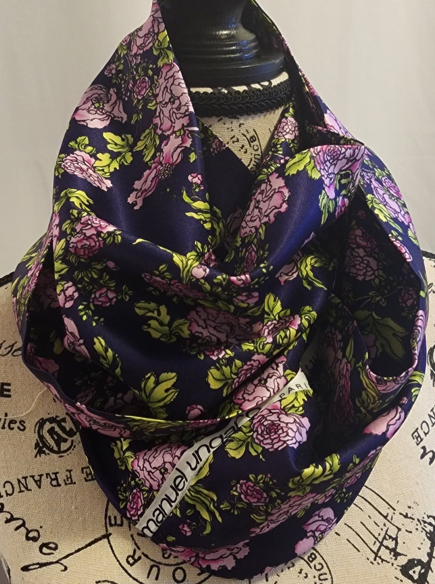 Ungaro silk blend infinity scarf with fuchsia flowers on a rich purple background