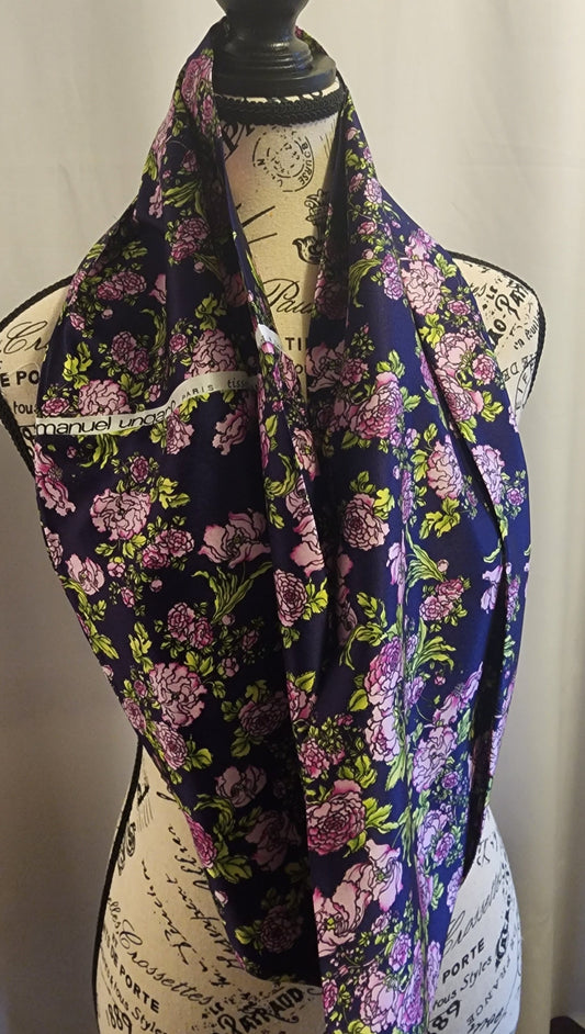 Ungaro silk blend infinity scarf with fuchsia flowers on a rich purple background