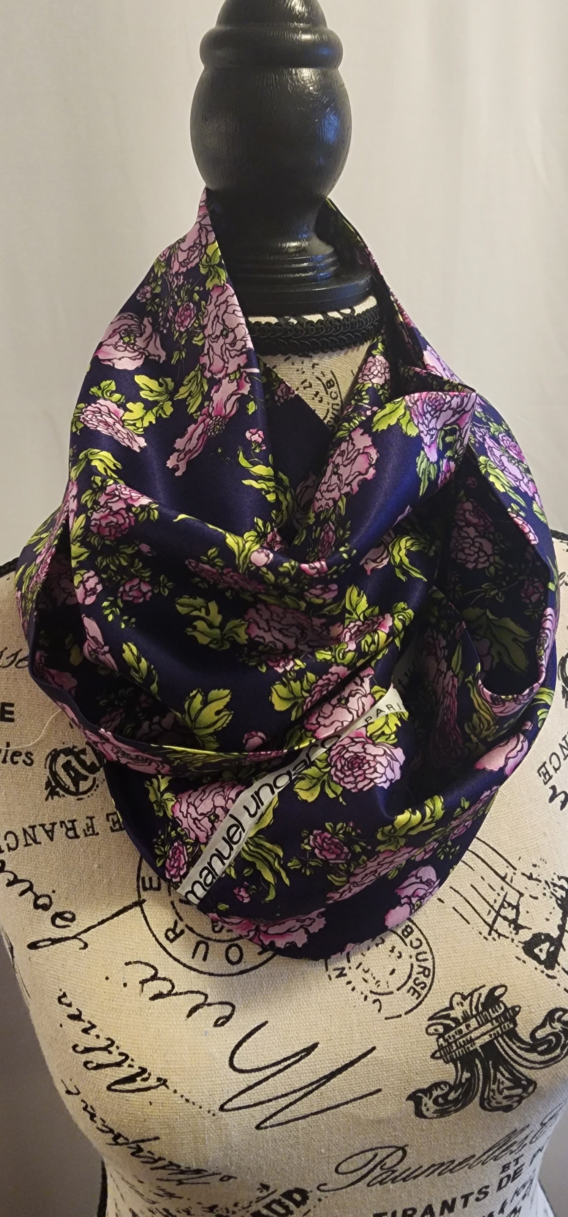 Ungaro silk blend infinity scarf with fuchsia flowers on a rich purple background