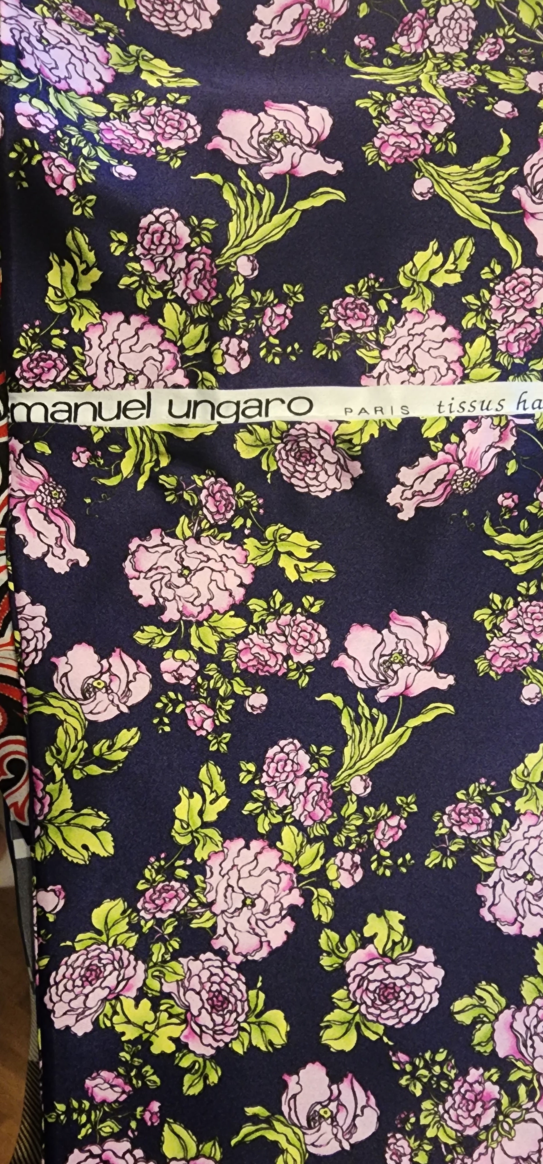 Ungaro silk blend infinity scarf with fuchsia flowers on a rich purple background