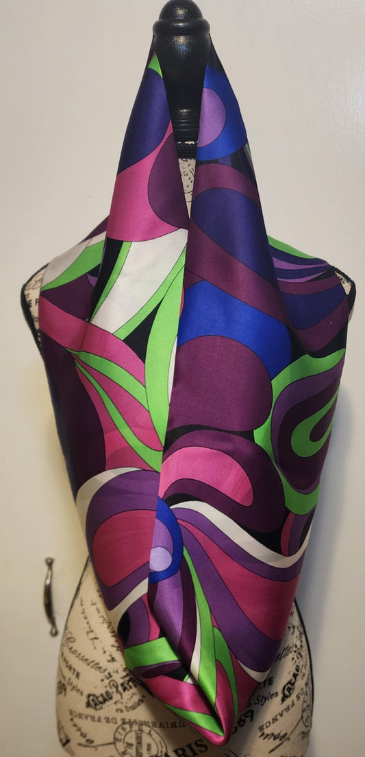 Purple, magenta, pink swirl floral pattern silk scarf with a Pucci influence