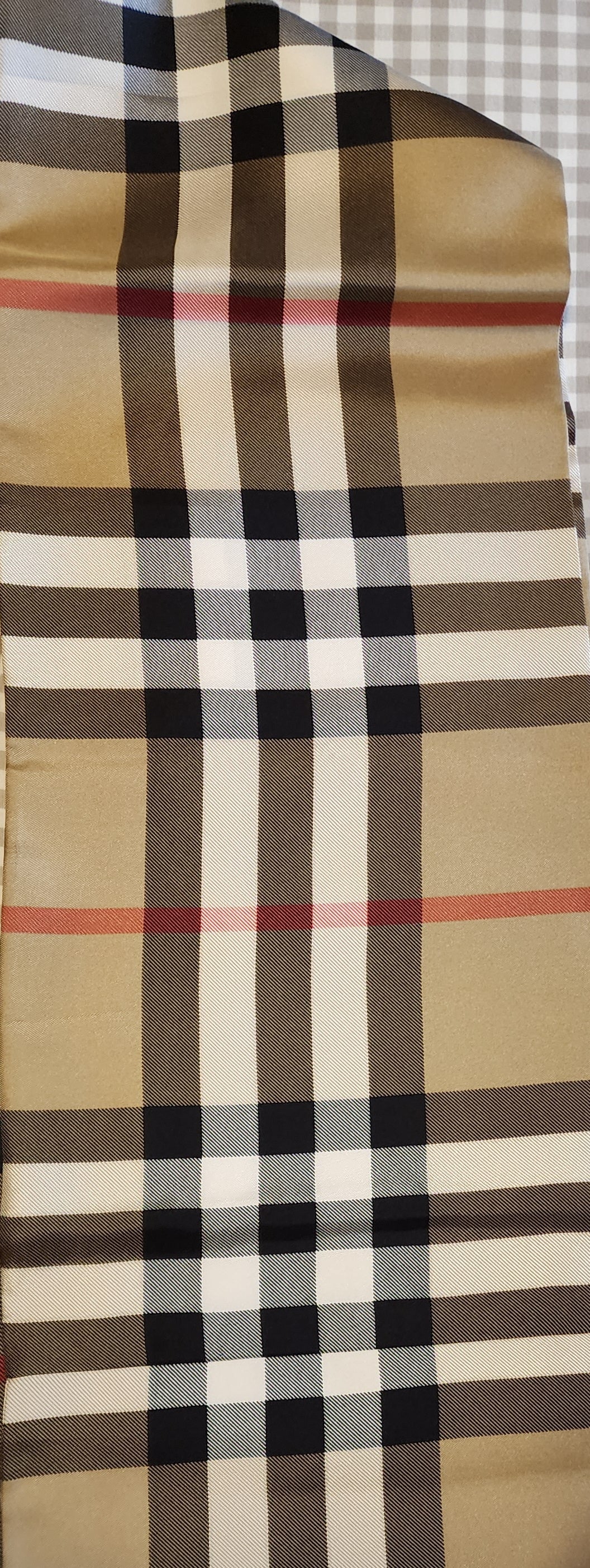 Burberry tan plaid silk infinity scarf, close up of plaid detail